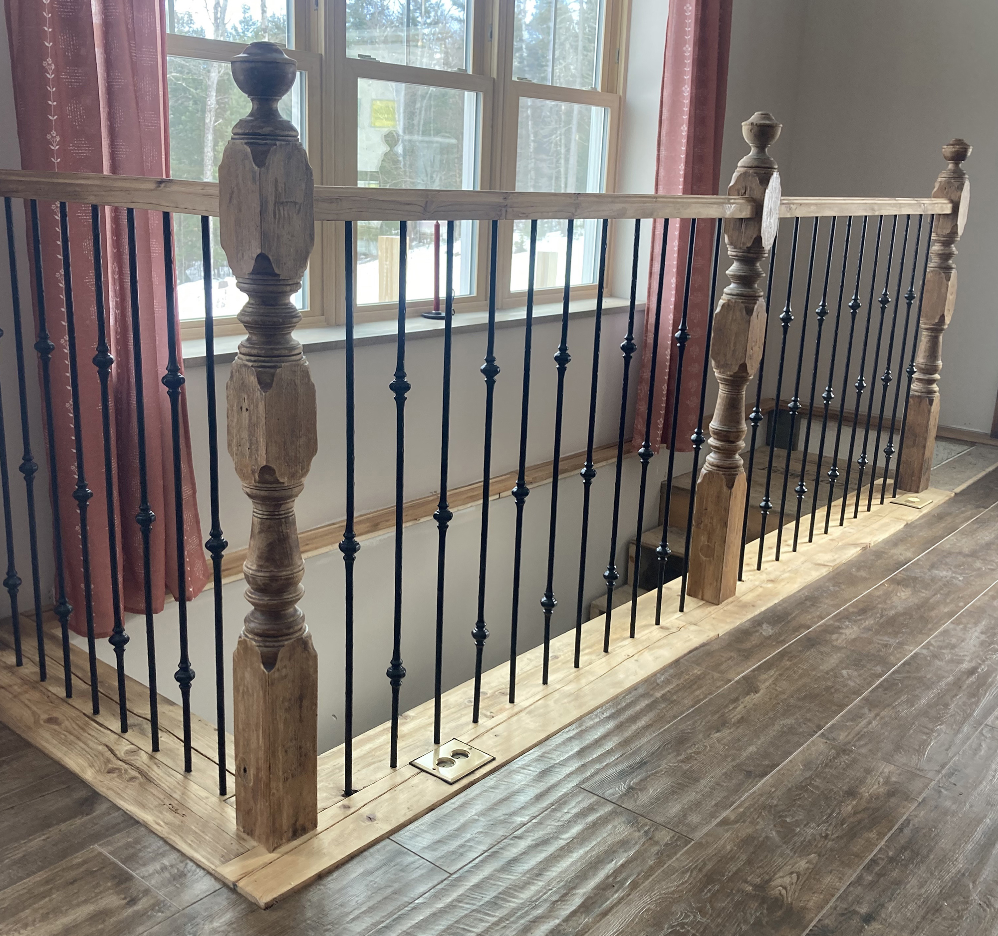 stair railing made of reclaimed posts