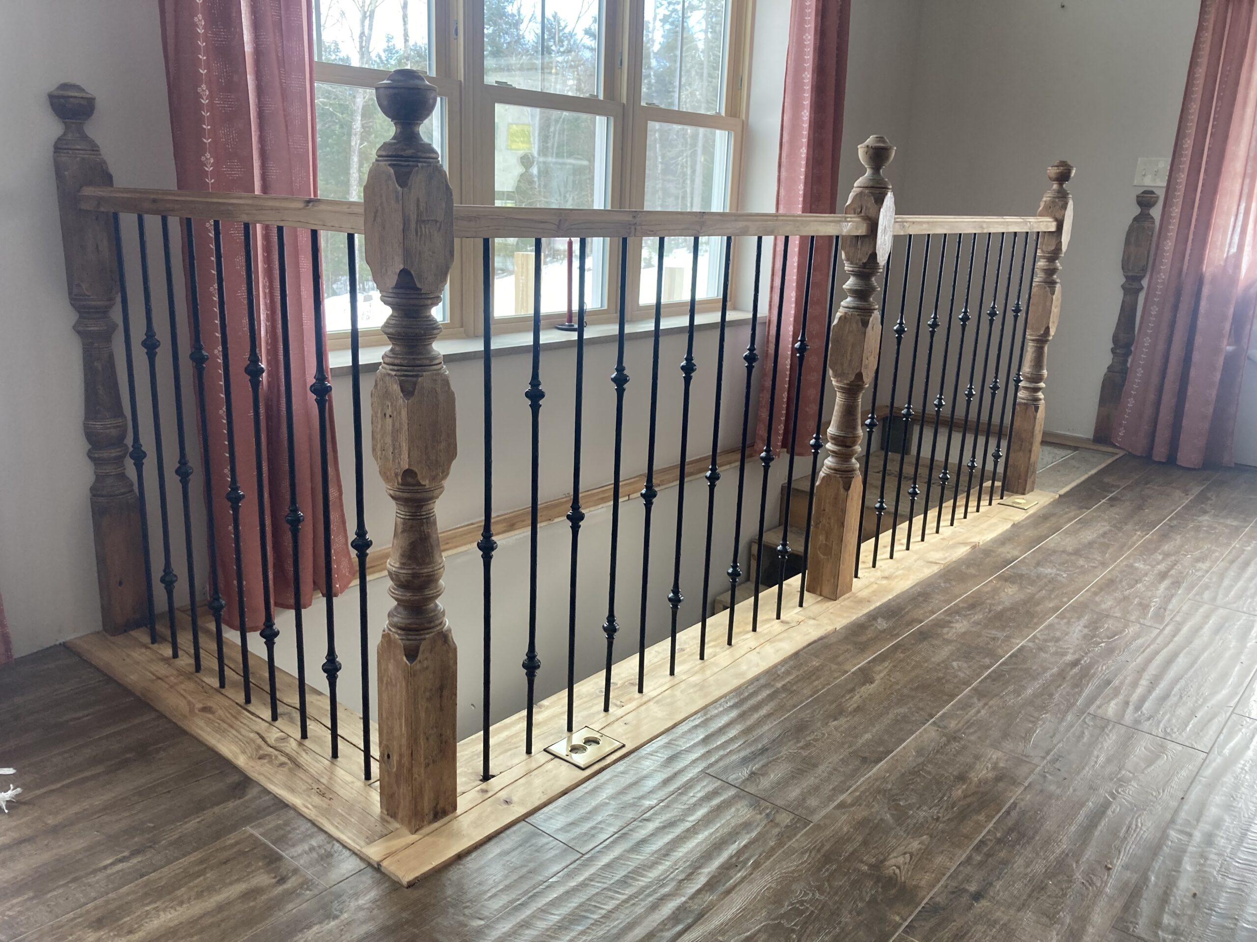 stair rail made from 1800s beams