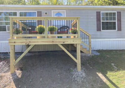 brand new deck with plants in sunshine