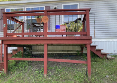 old red deck in need of repair