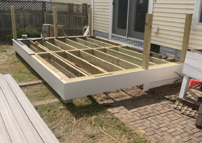 beginning of deck build showing frame and posts